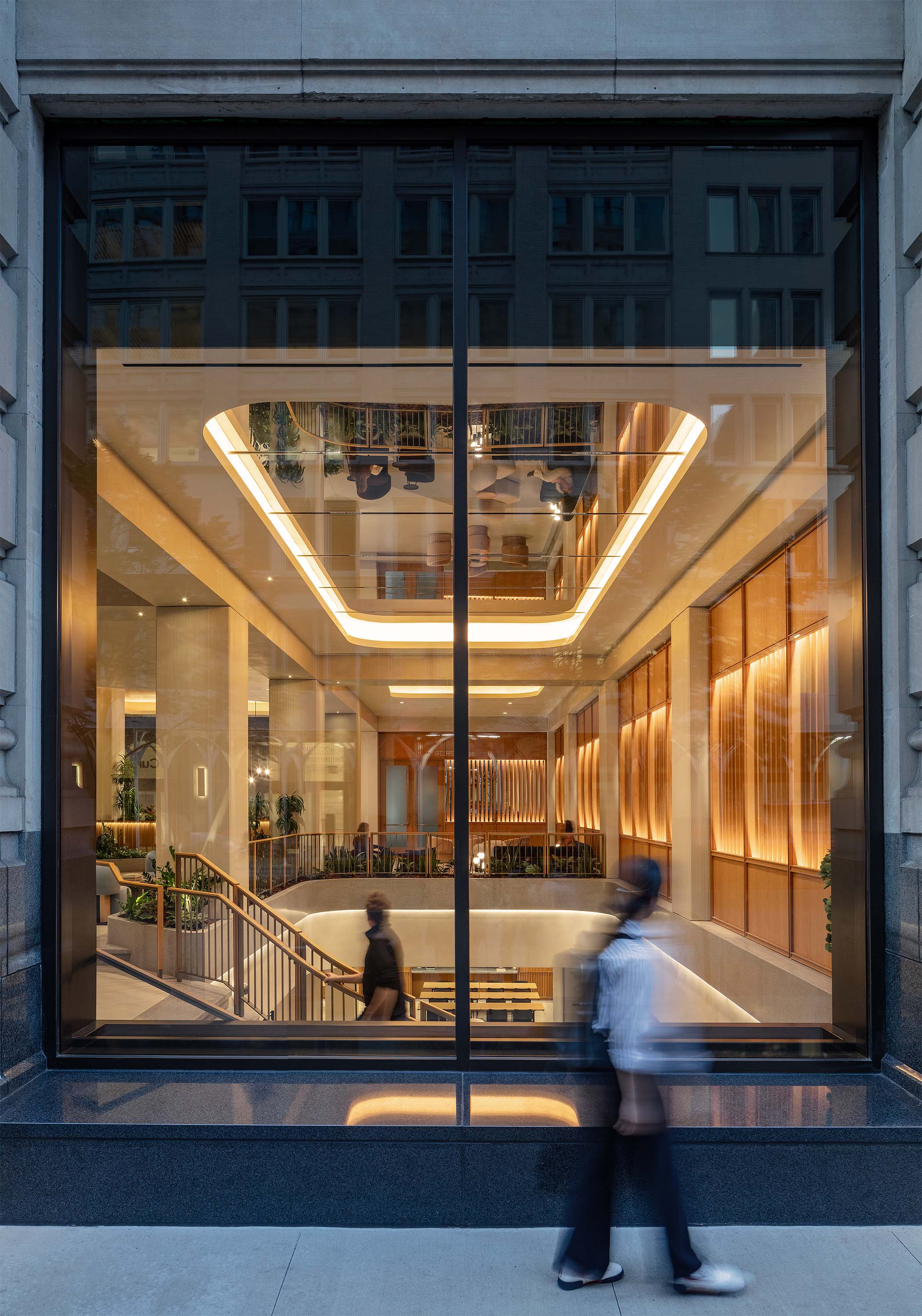 Exterior view of lobby at 360 park av S, NY sunset
